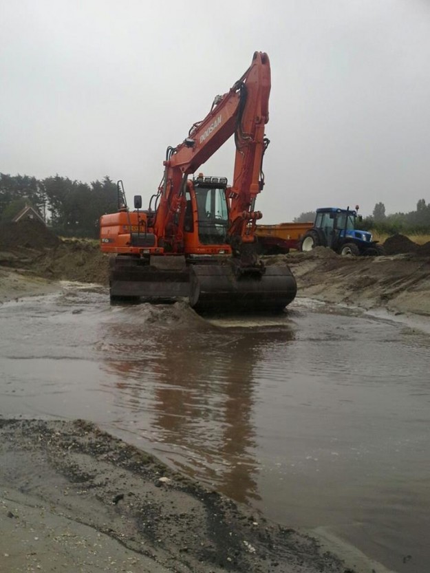 Het graven van een natuurlijke vijver 8
